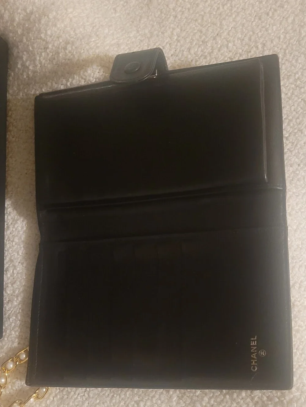 CHANEL Black Quilted Leather Wallet with Unbranded Pearl-Embellished Chain